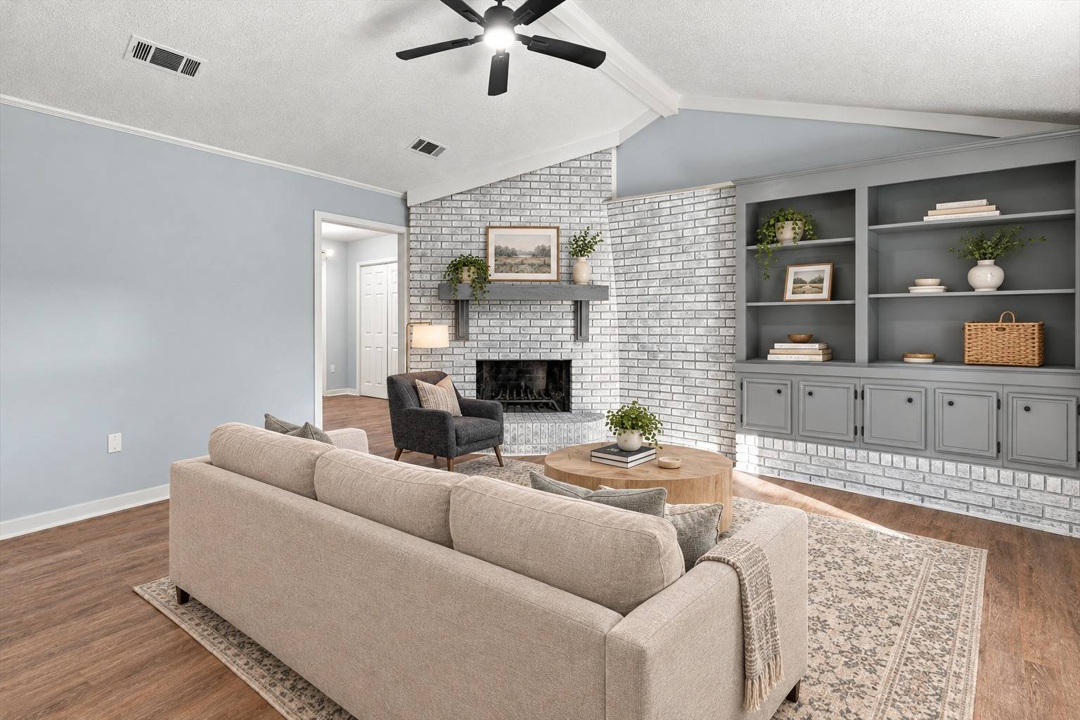 Living room built-ins and ceiling fan at 2381 Deer Oak Place