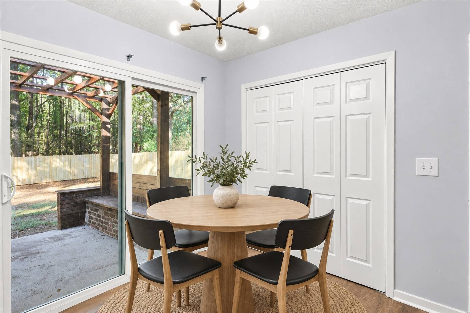 Dining area with sliding door to the covered patio at 2381 Deer Oak Place