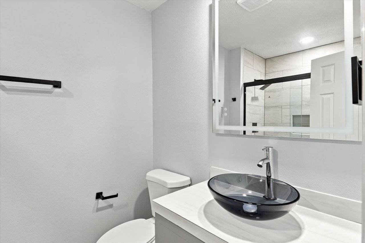 Second bathroom with vessel sink at 2381 Deer Oak Place