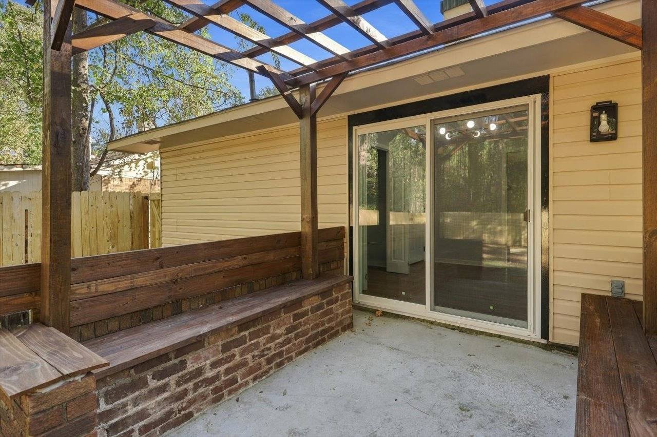 Covered back patio at 2381 Deer Oak Place